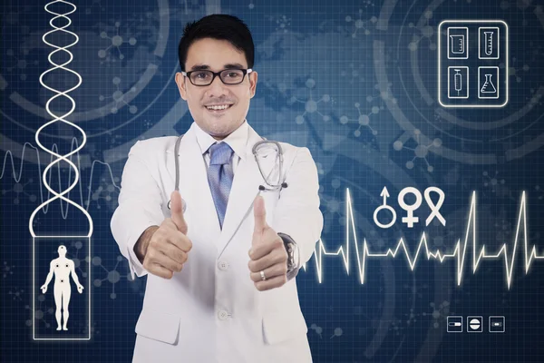 Doctor with thumbs up and futuristic screen