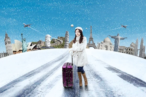 Young girl traveling in winter holiday