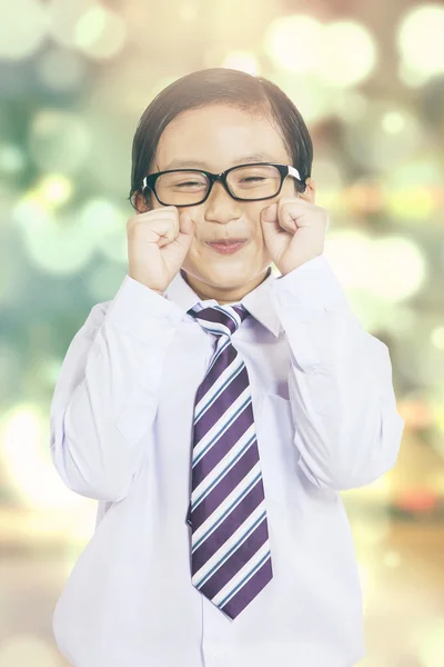 Little businessman with bokeh background