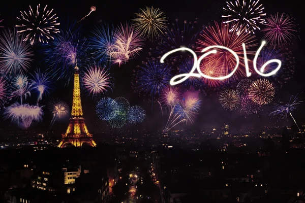 Eiffel tower with fireworks and numbers 2016