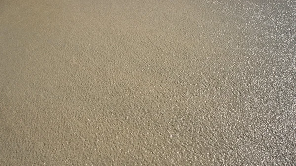 White coral sand and clear waters. Abstraction. background.