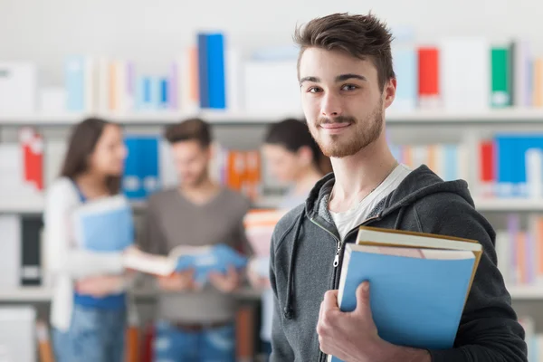 Student holding books