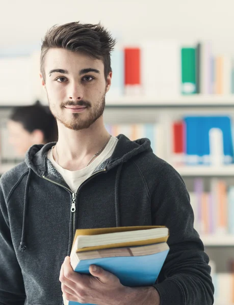 Student holding books