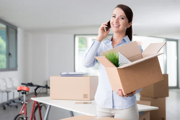 Woman moving in a new office