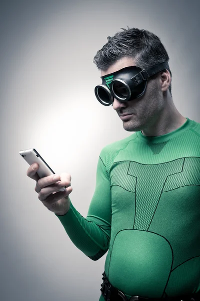 Superhero using a smartphone