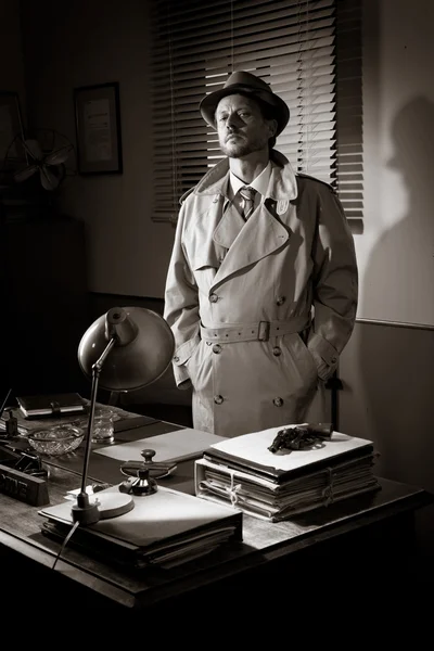 Detective standing in his office