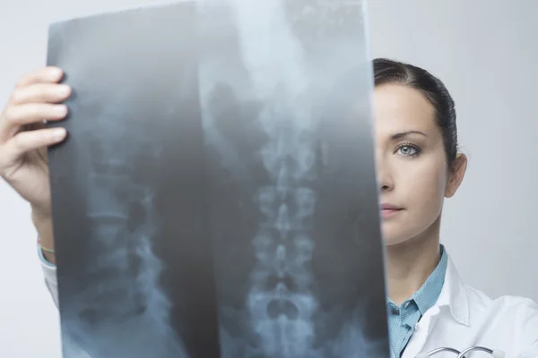 Radiologist checking x-ray