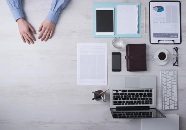 Businessman working at office desk