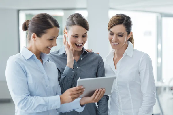 Business team using a digital tablet