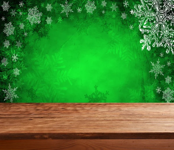 Empty  table with green christmas background