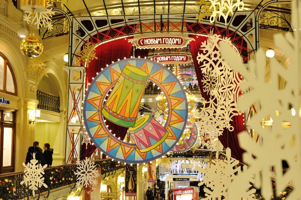Drawn drums, snowflakes and Christmas illuminations in GUM store