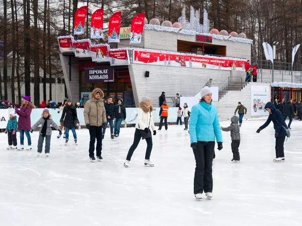 People relaxing at the skating rink