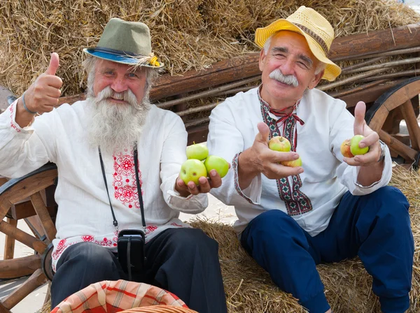 Senior men celebrating Apple Feast Day