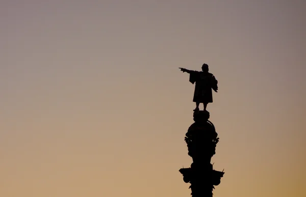 Barcelona Christopher Columbus statue silhouette over sunset clear sky
