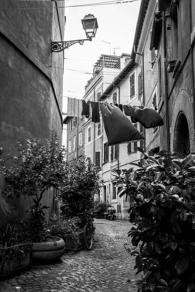 Black and white scene from Trastevere district of Rome, Italy