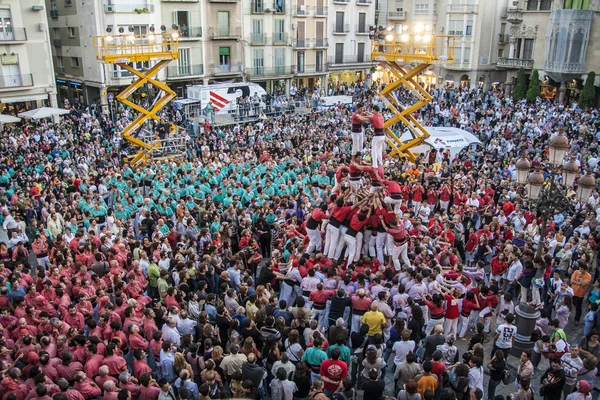 Reus, Spain - October 03, 2009: Castells Performance, a castell is a human tower built traditionally in festivals within Catalonia. This is also on the UNESCO Intangible Cultural Heritage of Humanity