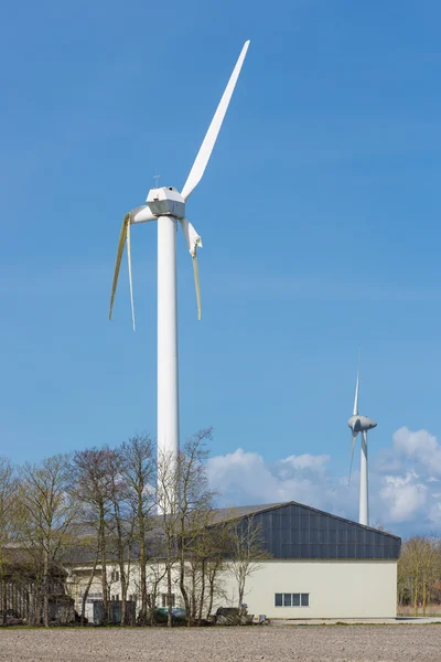 Wind turbine with broken wings after a storm in the Netherlands