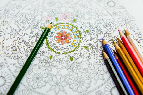 Anti-stress coloring book in the drawing process