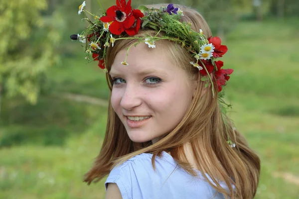 Teen girl with wreath
