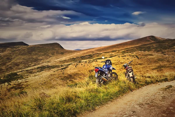 Panorama motorcicle on beautiful mountain landscape background.