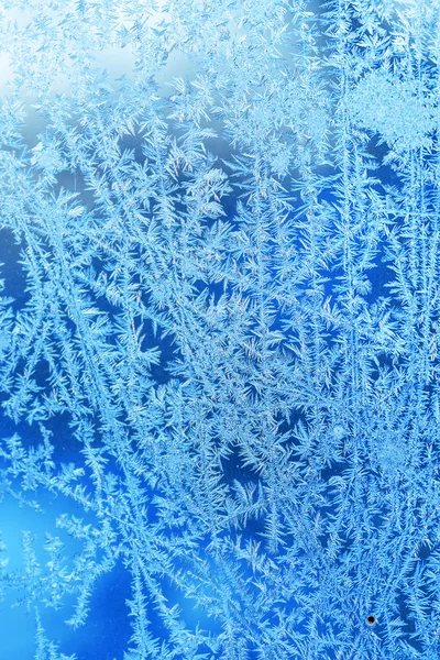 Winter ice frost, frozen background. frosted window glass textur