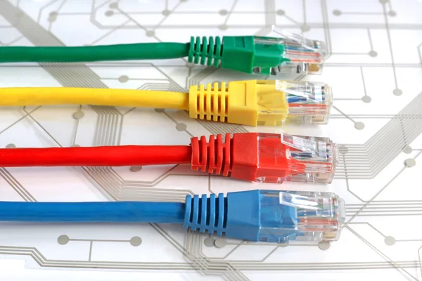 Four Multi Colored Network Cables on Circuit Board