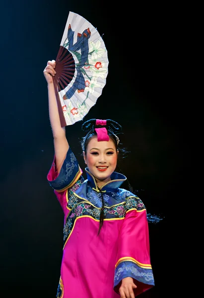 Pretty chinese national dancing girl