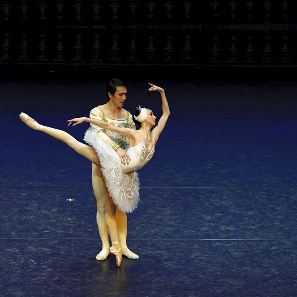 Ballet dancers perform on stage