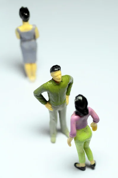 Man chatting with woman, and single woman