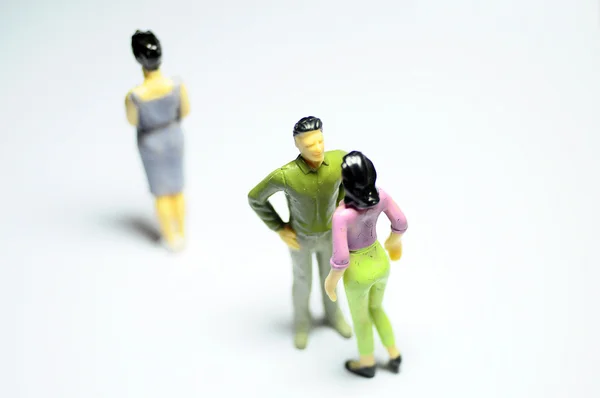 Man chatting with woman, and single woman