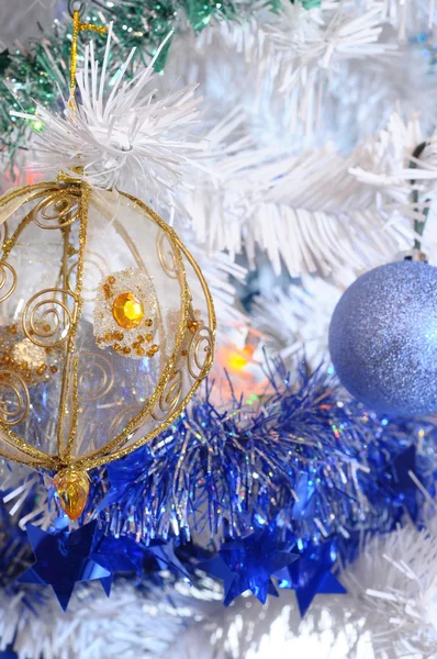 Tree, christmas balls and tinsel