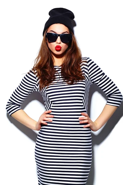 High fashion look.glamor stylish beautiful  young happy smiling woman model with red lips  in zebra dress in black beanie