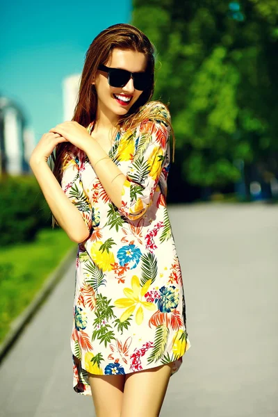 Funny  stylish sexy smiling beautiful young woman model in summer bright hipster cloth dress  in the street