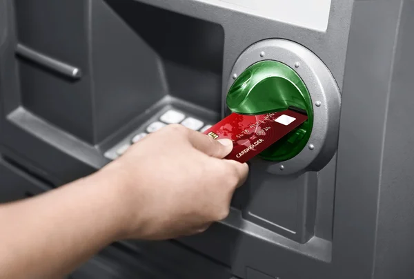 Human hand insert ATM card