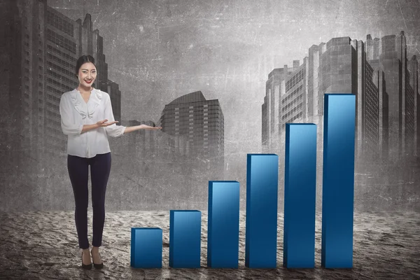 Businesswoman showing increase chart