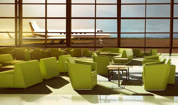 Green sofas in the airport lobby