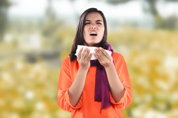 Young sick woman having cold