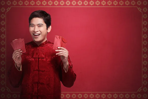 Handsome Chinese Man holding angpao