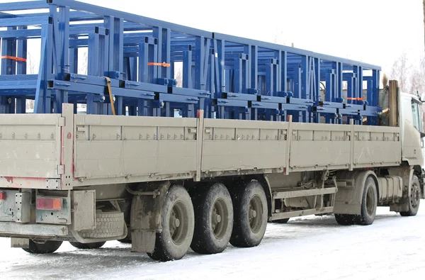 Truck loaded with metal structures