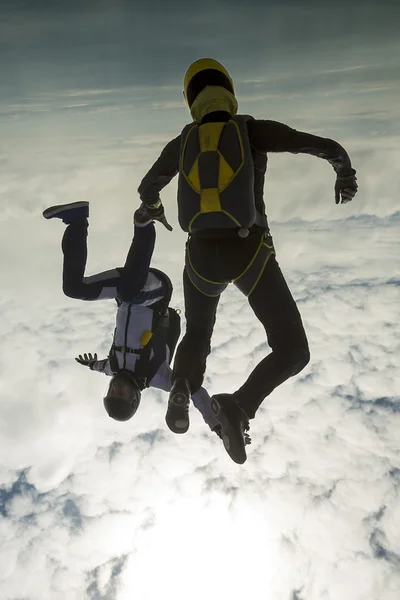 Skydivers perform pieces in free fall.