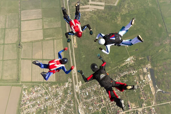 Sport  parachutists  build a figure in free fall.