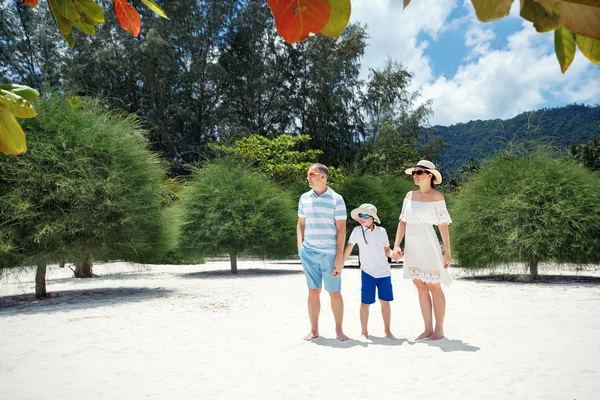 Happy beautiful family on Malibu beach during summer vacation, Koh Phangan Island, Thailand, Asia