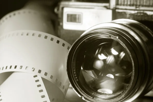 Close-up of old photo camera with metallic color.