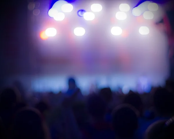 Photo of young people having fun at rock concert, active lifestyle