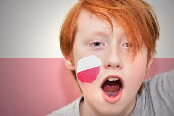 Redhead fan boy with polish flag painted on his face