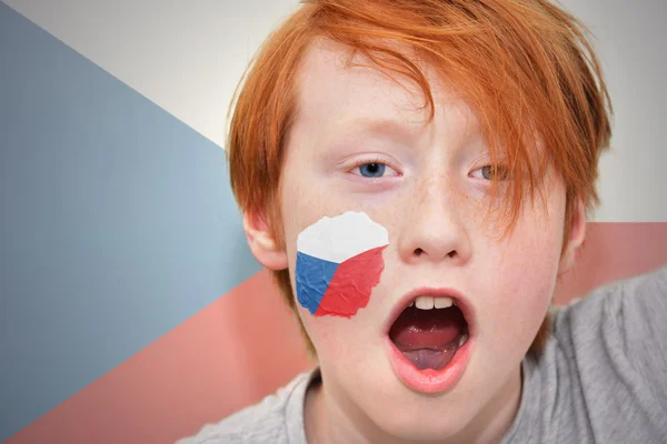 Redhead fan boy with czech flag painted on his face