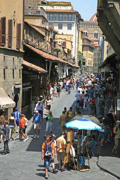 Tourists on the medieval bridge Ponte Vecchio