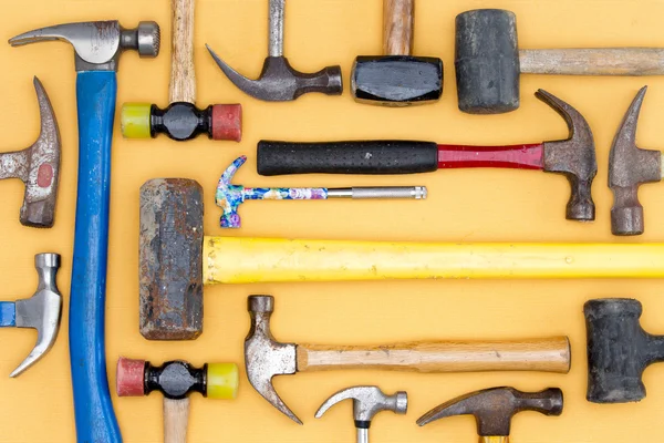 Display of a diversity of hammers in a tool kit