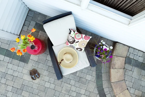 Relaxing Luxury Patio with Chair and Glass of Wine