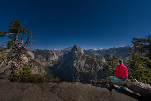 Night in Yosemite Girl looking at Half dome from the Glacier Poi